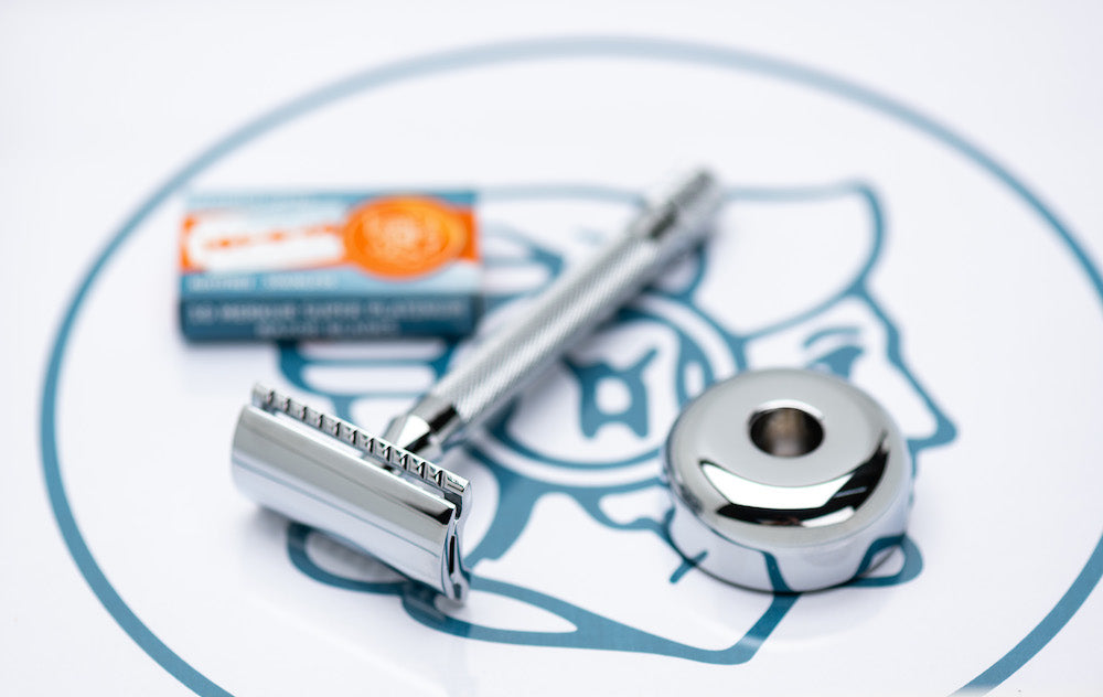 Safety razor on branded background