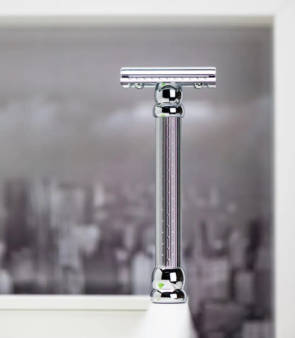 Safety razor on branded background
