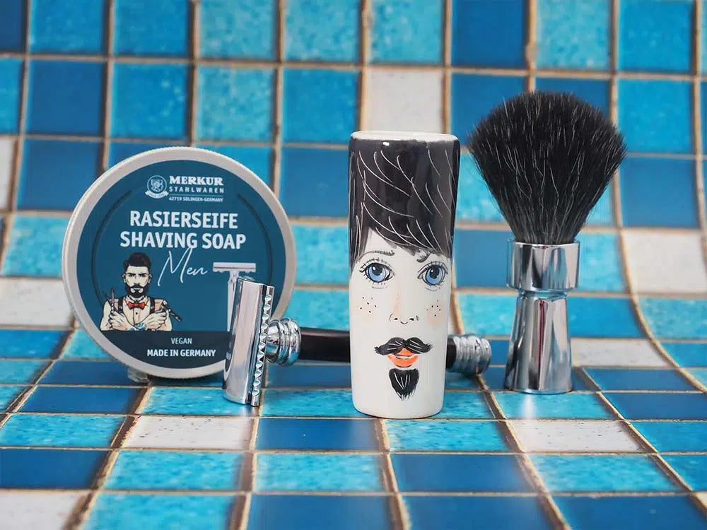 Safety razor on branded background