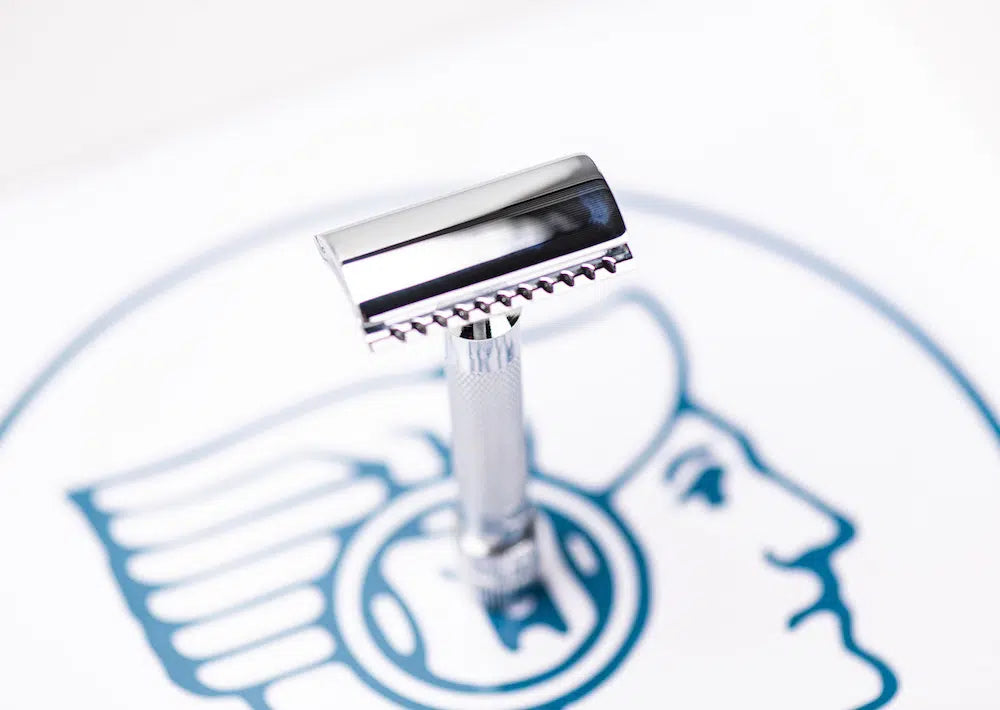 Safety razor on branded background